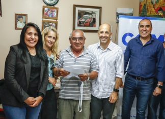 Entrega de botones de alarmas urbanas en William Morris